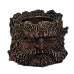 Tree trunk candle holder